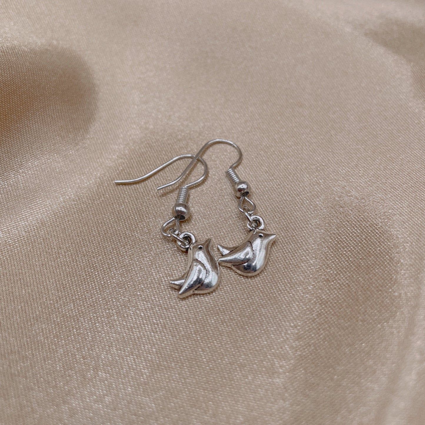 Winged Whispers Earrings